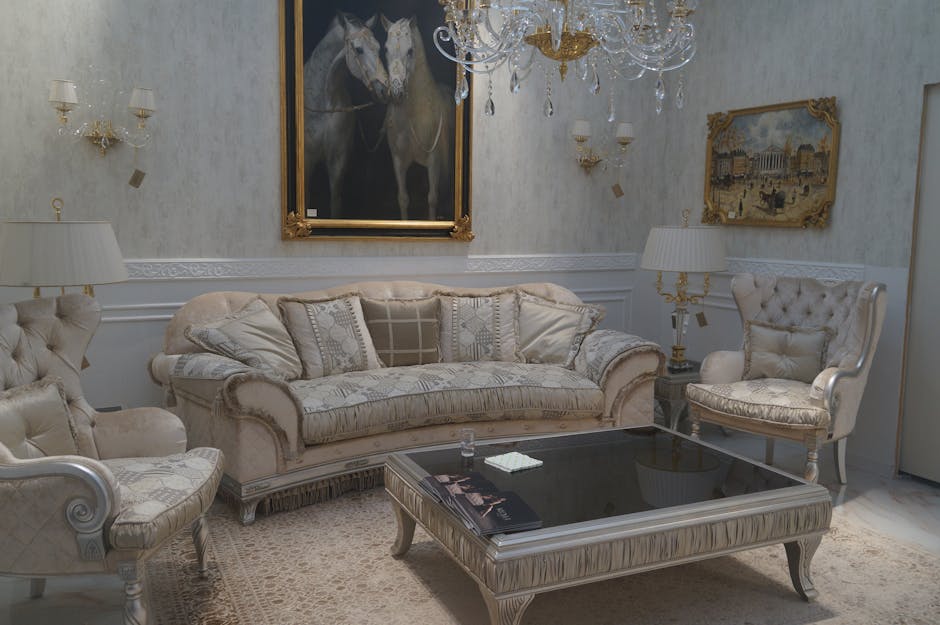 A sophisticated and luxurious living room interior featuring classic furniture and elegant decor.